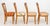 Set of Four Country Oak Dining Chairs, each with shaped crest rail, spindles, and shaped upholstered seat (each seat in...