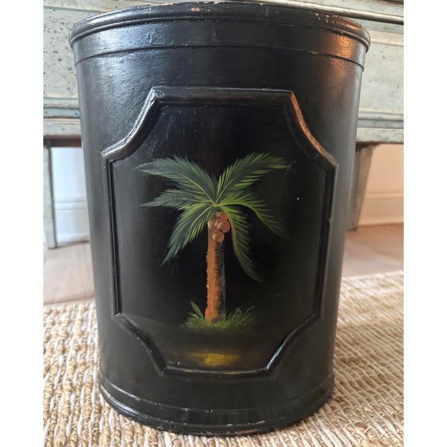 Tall umbrella stand with a handpainted palm tree to both sides. Pretty raised detailing to highlight the palm tree.