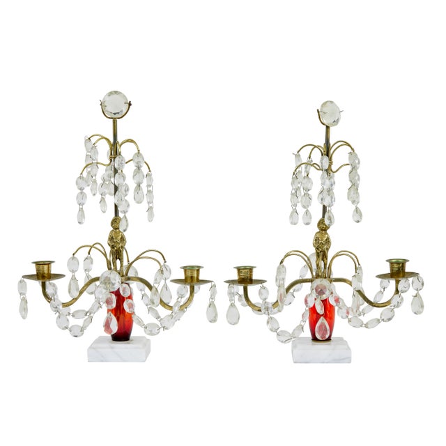 Pair of mid 20th century cut glass and marble candelabra circa 1960. main red plastic stem with a brass figure of boy in...