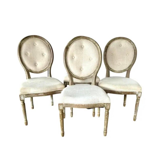 21st Century Louis XVI Style Upholstered Dining Chairs, Set of Four. Chairs have lovely carved wooden frames with a...