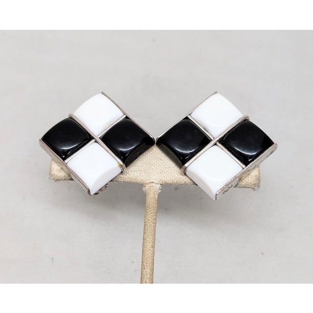 1950s square silvertone offset with two sections of square white resin and two sections of square black resin forming a...