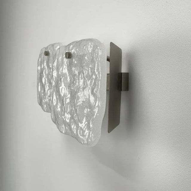 Brutalist Wall Light in Ice Glass from Kalmar, in Very Good conditions. Designed 1960 to 1969 I have official proof of...