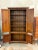 Design Plus Gallery presents an Early American Pine Wood Cabinet with Cherry Finish. The solid wood piece is well made...
