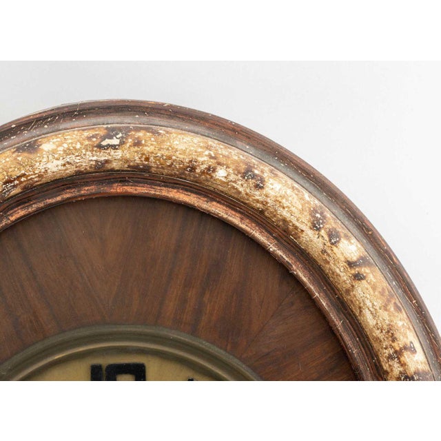 Early 20th Century French Art Deco Oval Mahogany and Brass Wall Clock For Sale - Image 5 of 7