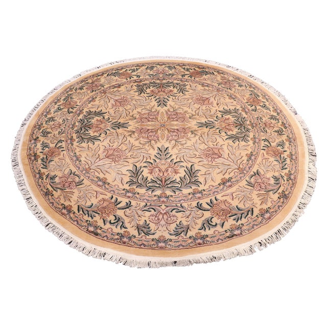 This hand‑knotted Pak Persian round rug showcases the finest expression of traditional Persian artistry. Each piece is...