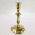 A fine antique English candlestick. With a 8 lobed petal base, a turned shaft, and an integral bobeche. Simply a fine...