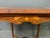 A very pretty Edwardian period inlaid mahogany occasional table. Of good construction and decorated with satinwood banding...
