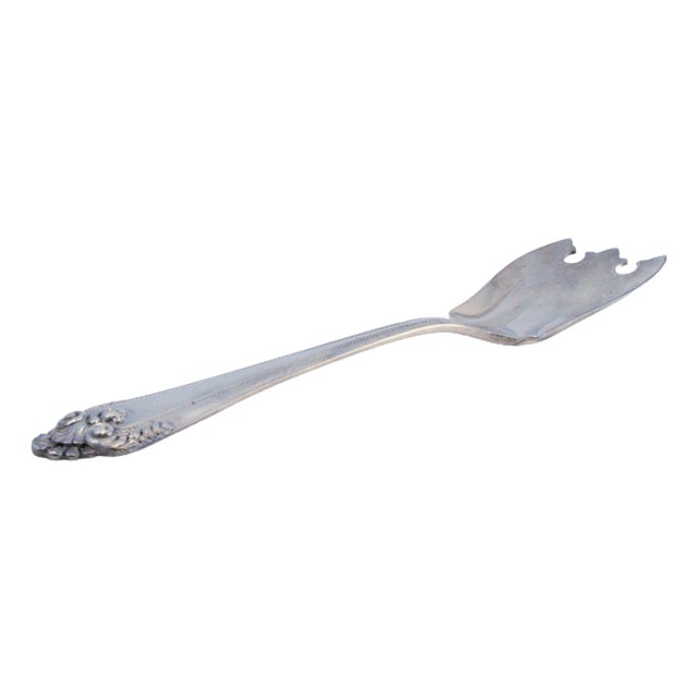 Silver Spaghetti Spoon with Reliefs For Sale