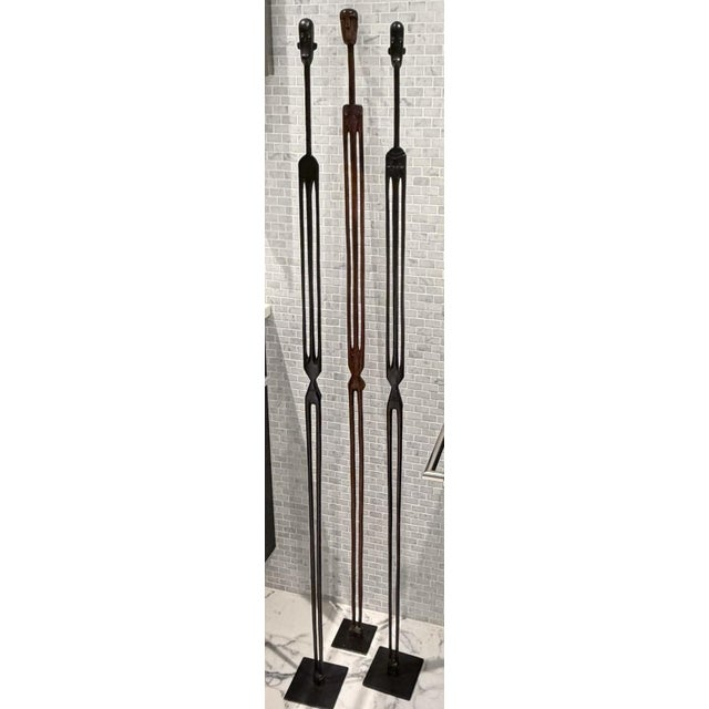 Sculptural Wooden Figures — Organic Modern, Primitive Minimalism A striking trio of hand‑carved wooden sculptures sourced...