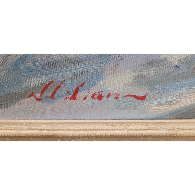 Beautiful vintage oil painting of flowers on a table and window ledge looking out onto a Cove signed and framed. Measuring...
