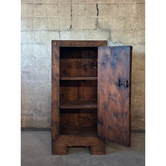 This antique French alpine cabinet has tons of character. Made of solid planks of pine with the original wrought iron...