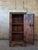 This antique French alpine cabinet has tons of character. Made of solid planks of pine with the original wrought iron...