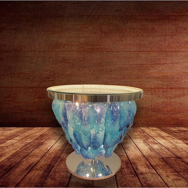Modern Italian illuminant table with infinity lit mirror, dressed with blue Murano glass leaves mounted on chrome metal...