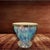 Modern Italian illuminant table with infinity lit mirror, dressed with blue Murano glass leaves mounted on chrome metal...