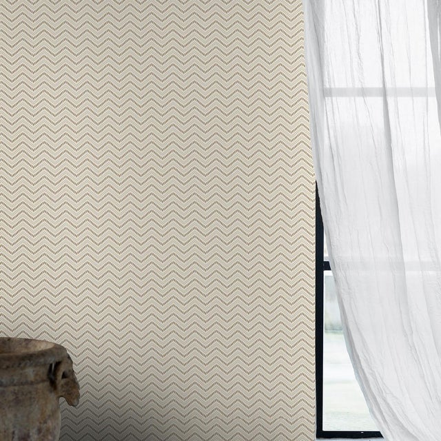 Chevron Dots in natural is a wildly chic wallpaper pattern consisting of wavy, zigzagging lines that appear to move...