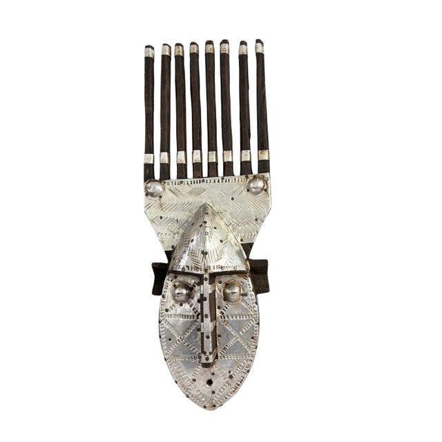 This exceptional vintage Ntomo Marka Mask, originating from the Bamana people of Mali, features a sophisticated blend of...