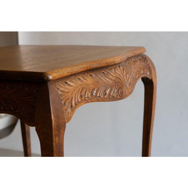 Sturdy well made exceptional side parlor table. Delightful craftmenship. I'm not sure of the maker or where it was made....