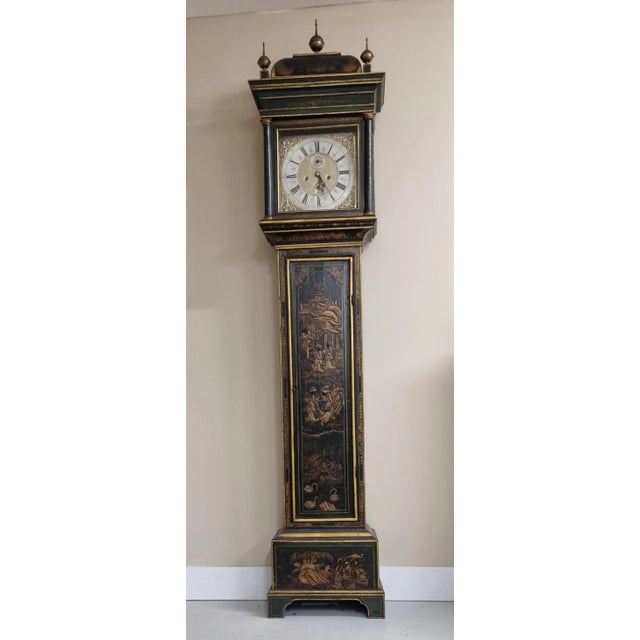 A superb mid 18th-century London longcase clock, finished in green japanned lacquer with gilt scenes of figures, pagodas,...