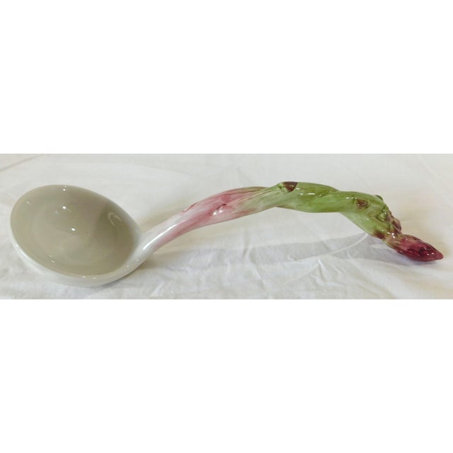 Wonderful vintage Fitz and Floyd "French Market" replacement asparagus ladle. Excellent Condition as shown. Measures 11...