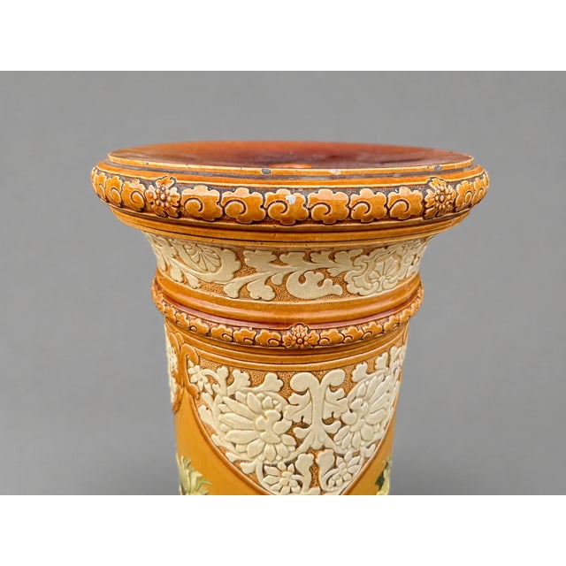 An impressive antique English porcelain pedestal column, dated 1913 and beautifully decorated with hand-painted floral...