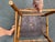 A vintage barrel-back oak captain's chair, also commonly referred to as a firehouse, pub, or courtroom chair. The wood...