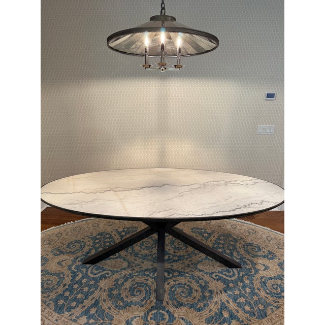 Featuring elegant white marble, surrounded in a hand-finished oak edge. Spider-leg metal base that will elevate any...