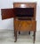 Exceptional solid mahogany bedside cabinet with flame mahogany veneer on the drawer and door fronts. Having its original...