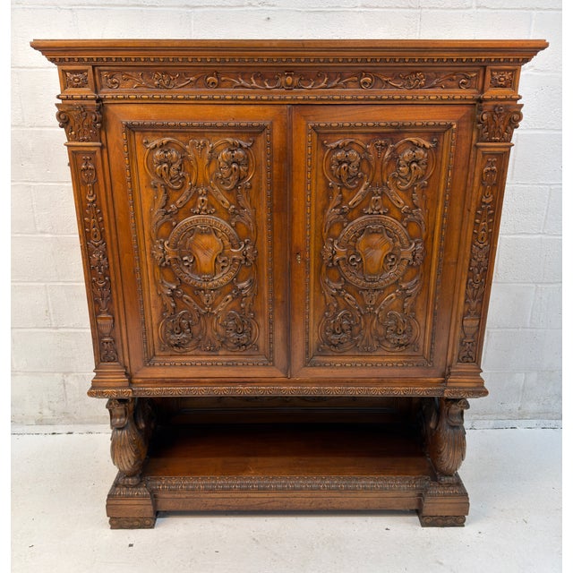 Exceptional Antique French Renaissance Revival carved oak cabinet, showcasing an extraordinary level of figural and...