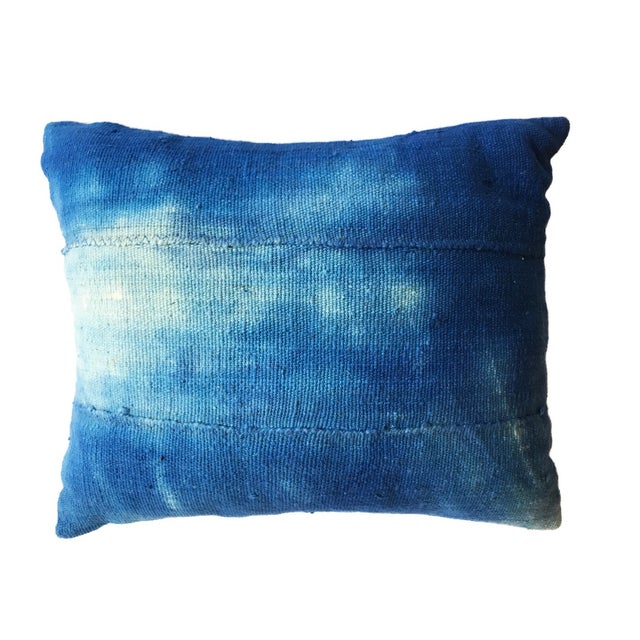 Authentic vintage cotton indigo pillow made from textiles from west Africa. Each is beautifully unique with hand stitching...