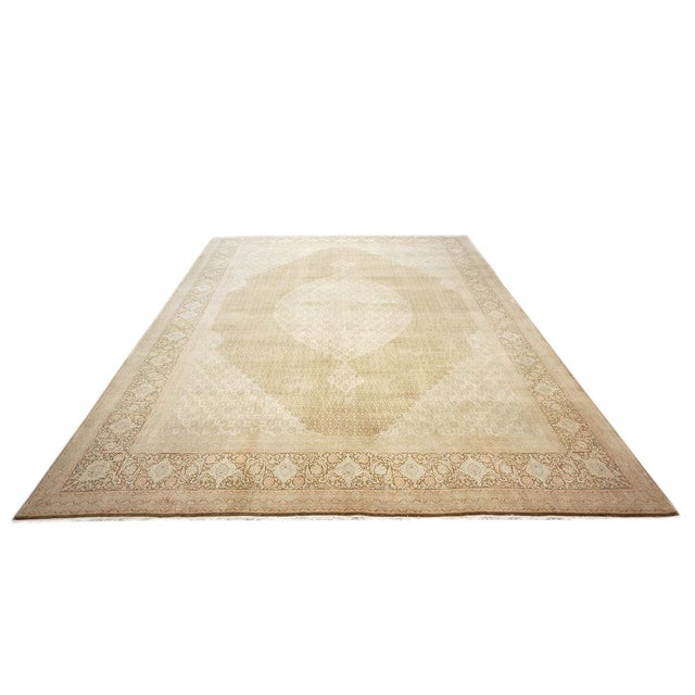 Condition: Antique Circa: 1940s Origin: Persia Design: Tabriz Actual size: 9'9" x 13'6" Thickness: 1/4 In. Color: Brown,...