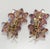 Vintage clip earrings embellished with light purple crystal beads and iridescent rhinestones in a double floret design....