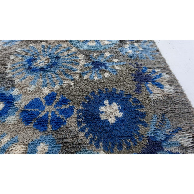 Vintage Rya Rug by Margareta Grandin Nettles (Bla Flora) Size: 4.10" × 6.10" (147 × 208 cm) A visually arresting vintage...
