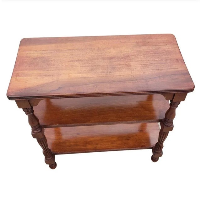 Classical American 3 tier mahogany side table. First tier 4" high and 2nd tier is 14.5" high. Overall measurements are...
