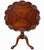 Elegant, matched pair of Chippendale-style mahogany tilt-top pedestal side tables featuring beautifully shaped piecrust...