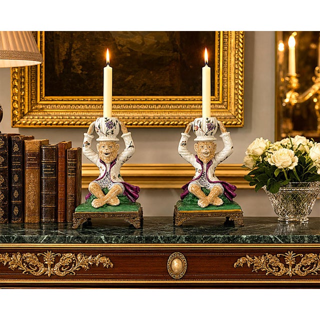 Offering a whimsical LARGE pair of hand painted Chinese intentionally crackled porcelain monkeys, circa Late 20th Century,...
