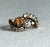 A striking vintage 14K yellow gold bypass cocktail ring with a distinctly **Victorian Revival** sensibility. The natural...