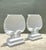 This elegant pair of vintage clam shell pedestals reflects the timeless appeal of neoclassical design, drawing inspiration...