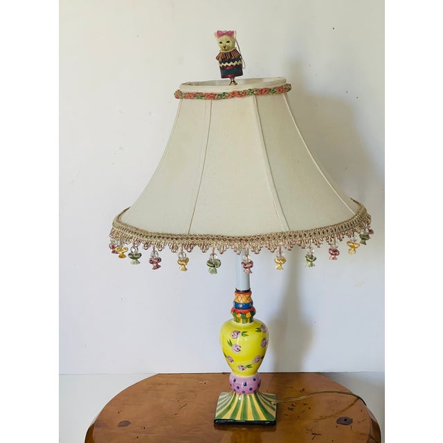 Handpainted colourful MacKenzir Childs Style table lamp with shade with beaded fringes. Toy cat figurine artisan made as...