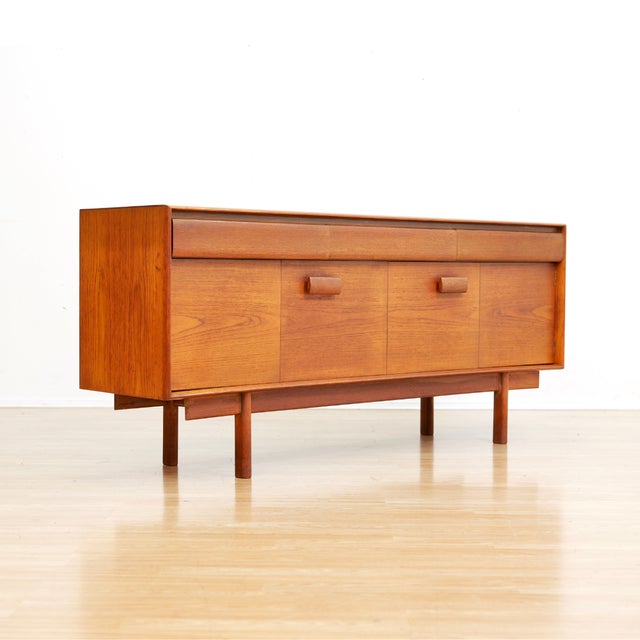 This superb ‘Winchester’ teak credenza was designed by Philip Hussey for White & Newton of Portsmouth, 1960s. Features a...