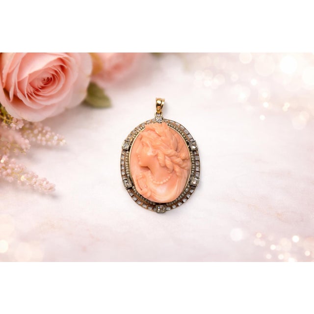 Discover a true collector's masterpiece: an antique cameo pendant made of rare, delicate "Angel Skin" coral, depicting the...
