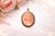 Discover a true collector's masterpiece: an antique cameo pendant made of rare, delicate "Angel Skin" coral, depicting the...