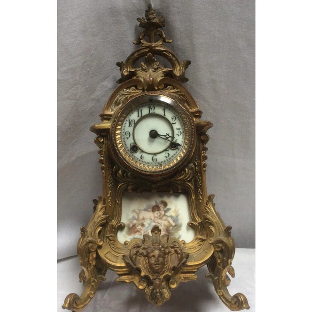 Beautiful antique French clock with Porcelain. This has the movement but may need some work. This has Cherubs on Porcelain...