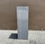 Stylish postmodern winter grey laminate pedestal with chrome striping, giving it a touch of mid-century modern feel....