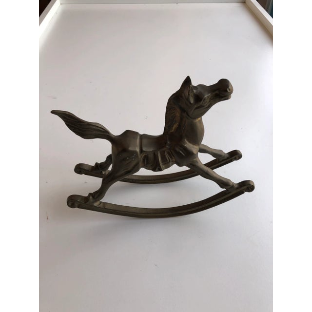 Vintage brass rocking horse 7"L X 6"H X 2" D , No makers mark , in excellent condition.