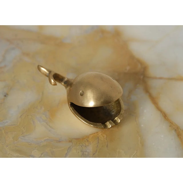 1950s ashtray – a whale-shaped marvel meticulously crafted from brass with a captivating patina. This Italian-designed and...