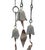 A bronze and copper wind chime with three bells and chain. The wind chime features a cluster of three bronze verdigris...