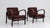 A pair of mid-century armchairs attributed to Kozelka, featuring bentwood frames combined with upholstered seating. The...