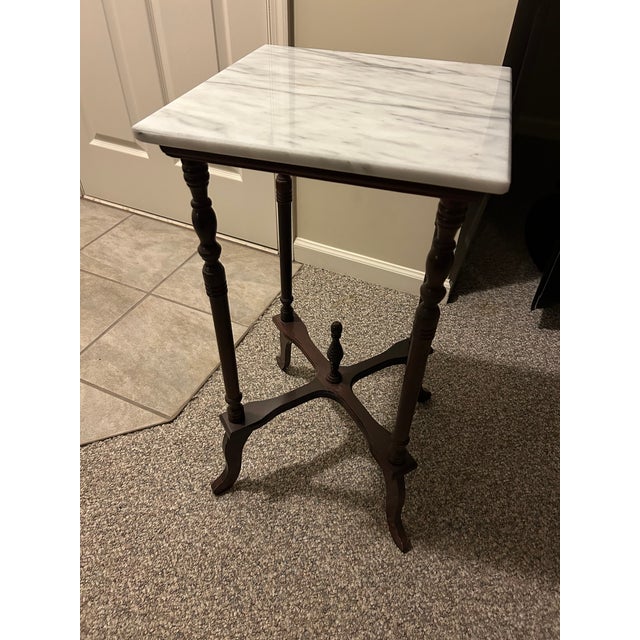 Marble top table/plant stand.