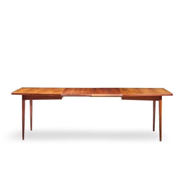 Jens Risom Mid Century Walnut Surfboard Expanding Dining Table with 2 Leaves This table measures: 60 wide x 35.75 deep x...