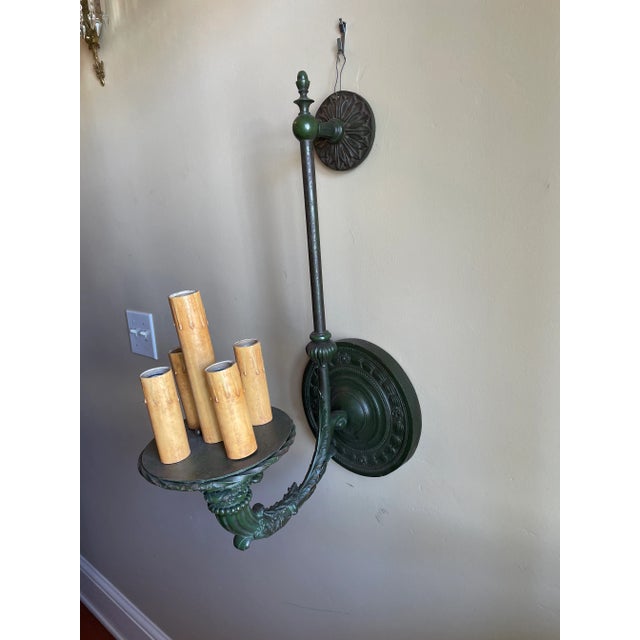 Pair of Elegant mixed metal sconces made of iron & brass, circa 1910. Meticulously restored in their old iron and dark...